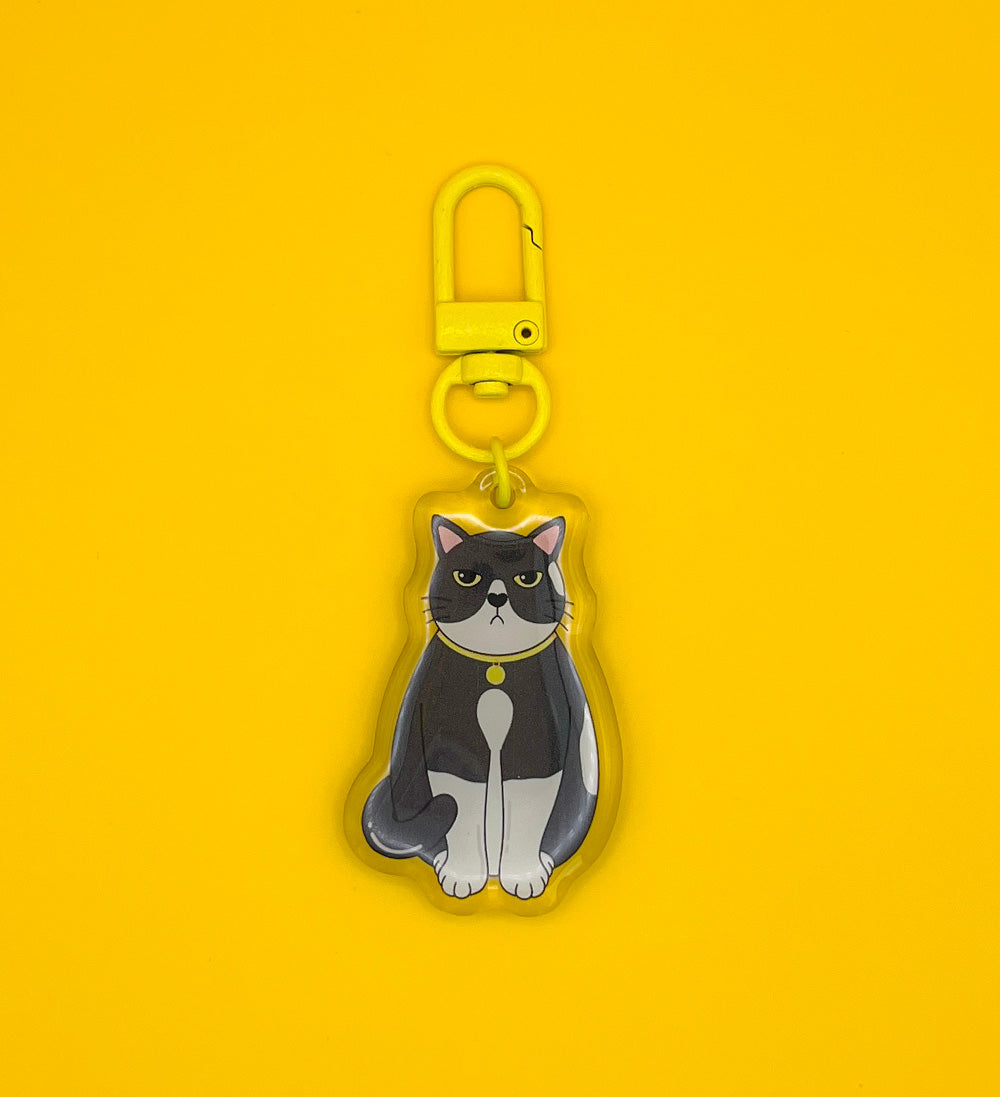 Porte-clés Chat Noir et blanc grincheux